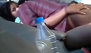 Indian girl has a sacristan quickie in a car, but doesn't emerge to like it.