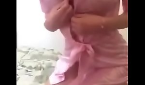 Chinese webcam girl pink satin put on clothing tease