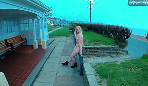Young blonde showman wife walking nude around Felixstowe seafront, England